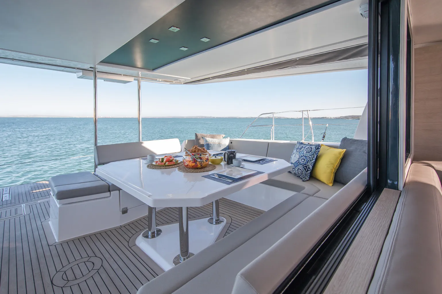 Shaded aft cockpit dining looking out to open ocean