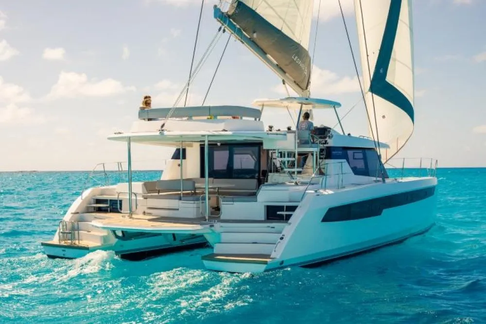 Honey Moon underway off the Barbados coast with sails up