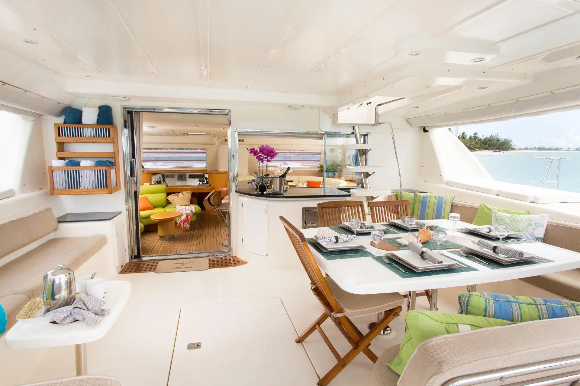 Interior saloon with teak details and dining area