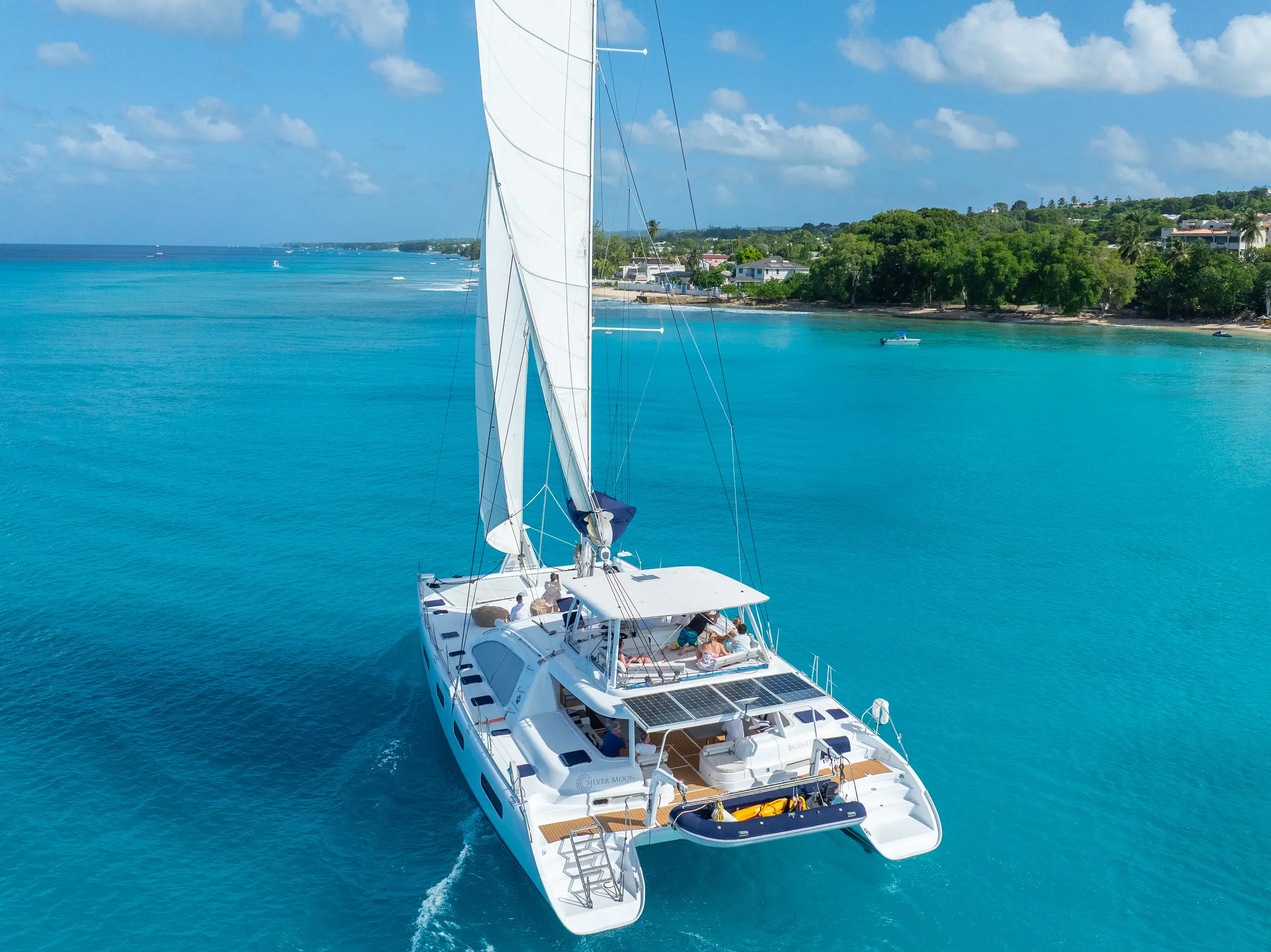 Silver Moon sailing past the Barbados shoreline