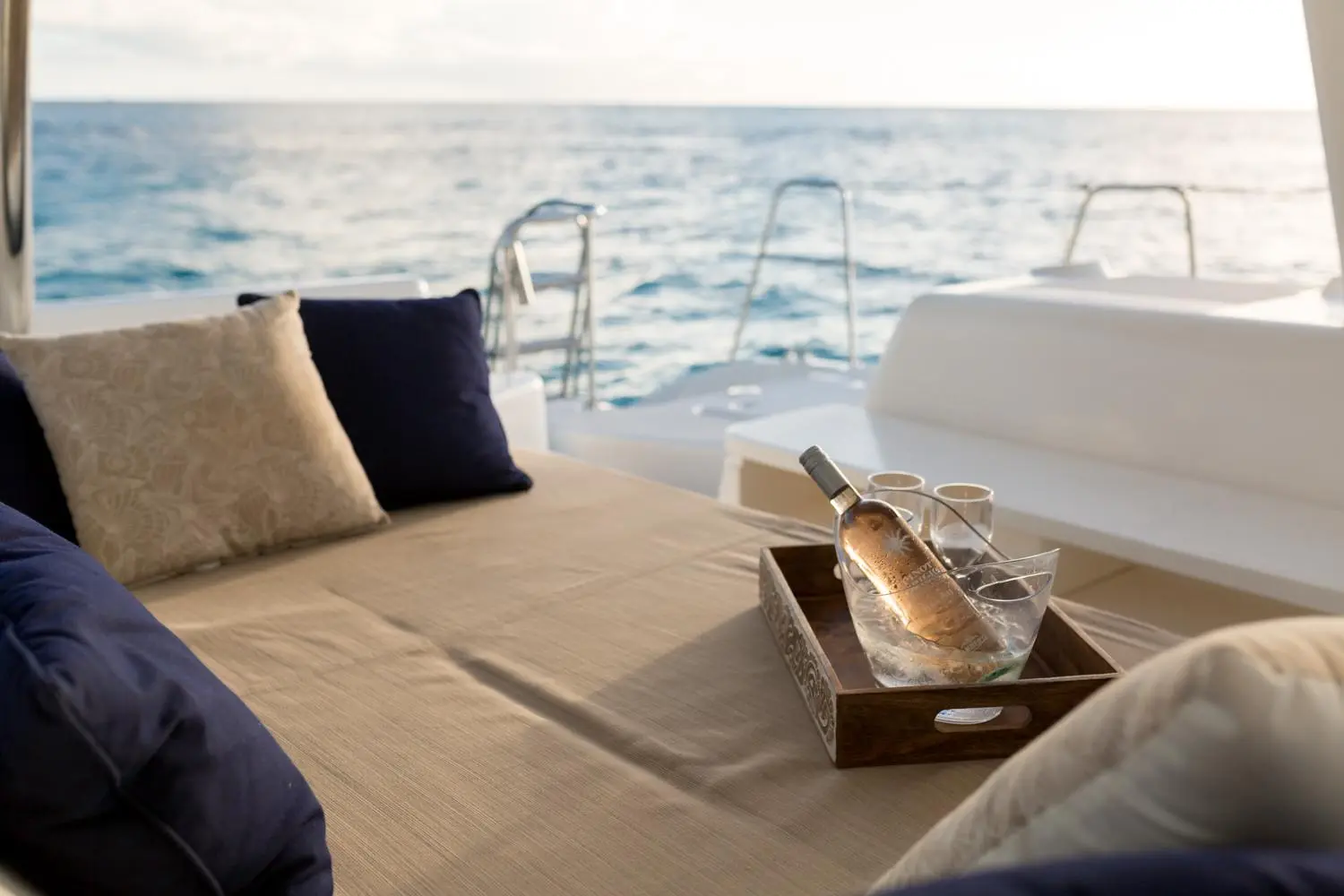 Daybed detail with rosé and sea views