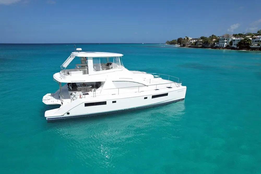 Silver Dancer at anchor — aerial view in turquoise waters